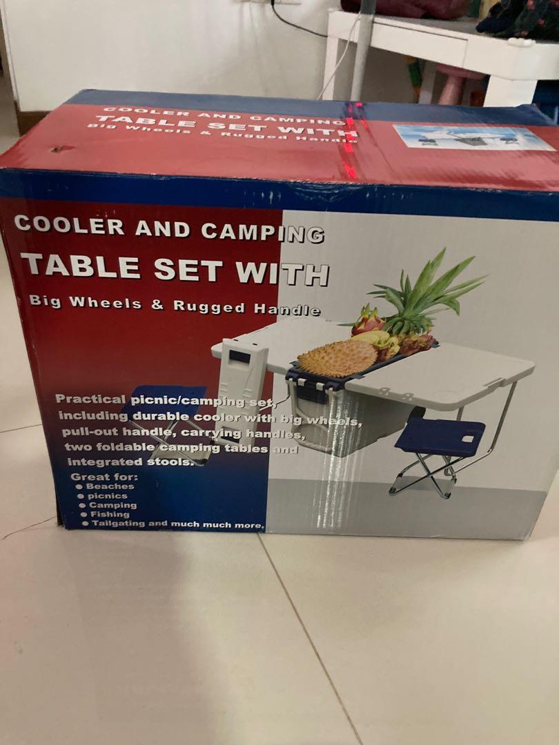 Table set with big wheels (Category: Hiking & Camping) located in Singapore. Submitted by caribarg (Listing ID 1136878940, Image 2). Description: Selling away table set as not an outdoor fan. Amazon is selling at $140-160. .