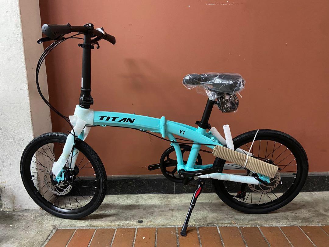 Titan folding bike store