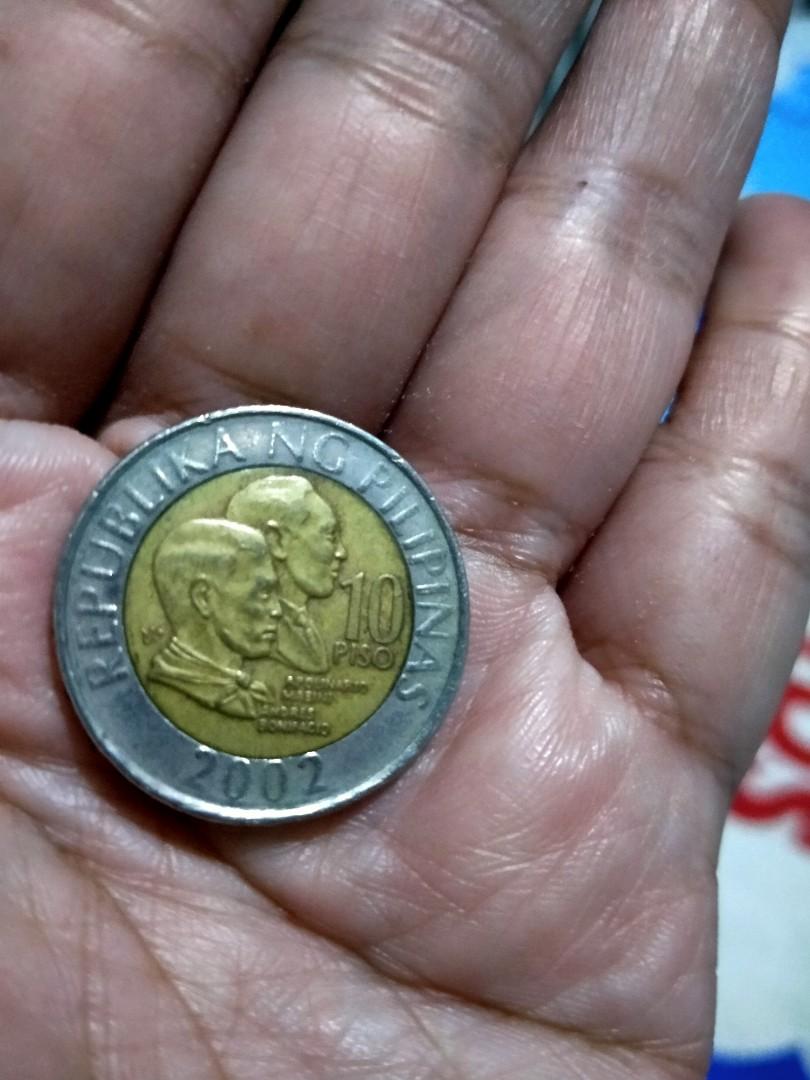 10 PESO COIN 2002 (Category: Currency) located in Quezon City. Submitted by loisxlane (Listing ID 1137232612, Image 1). Description: - 2002 - still in good condition - for shipping only @ buyer's expense and preferred courier - pymt First through bdo online or gcash.