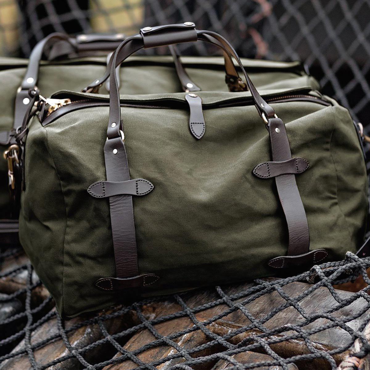 Filson Rugged Twill Duffle Bag (Medium) in Otter Green, Men's Fashion, Bags,  Sling Bags on Carousell