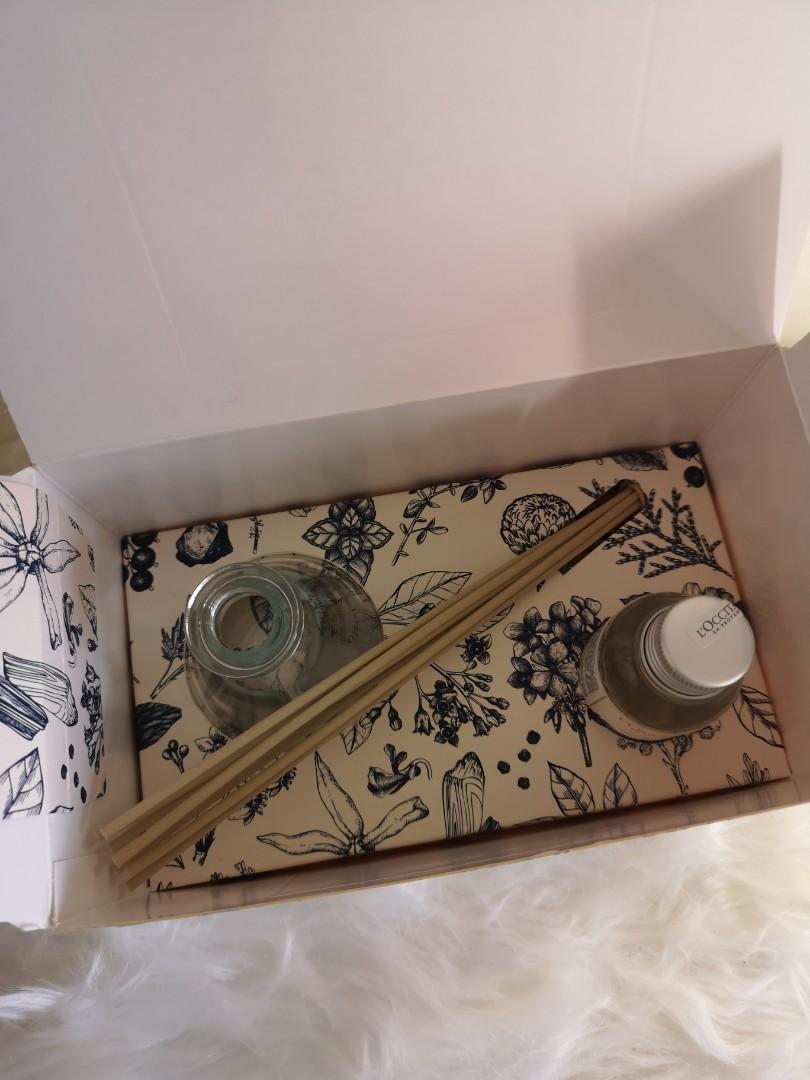 L'occitane Diffuser (Category: Home Fragrance) located in Singapore. Submitted by hellobeauteful (Listing ID 1137087880, Image 2). Description: Rest of the set looks like brand new just that the bottle of fragrance is slightly more than half full..