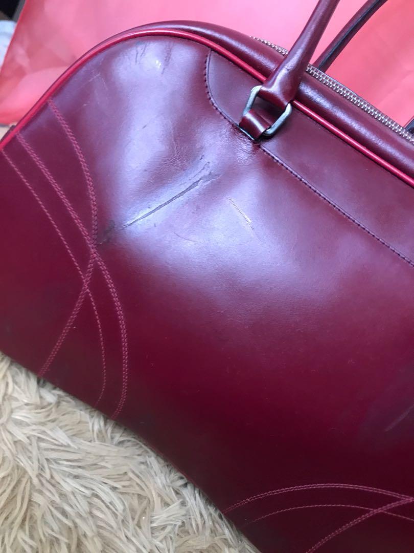 Prada Long Strap Boston (Category: Luxury Bags & Wallets) located in Manila. Submitted by joylauthenticbags (Listing ID 1137142593, Image 2). Description: Guaranteed Authentic preloved item from Japan Location: Malate, Manila Delivery via: LBC COD/COP, JRS, J&T or your preferred courier within Manila Payment: BPI, GCash Please visit our page: facebook.com/JoyLAuthenticBags Actual photos posted. Interested buyers may ask for more photos. .