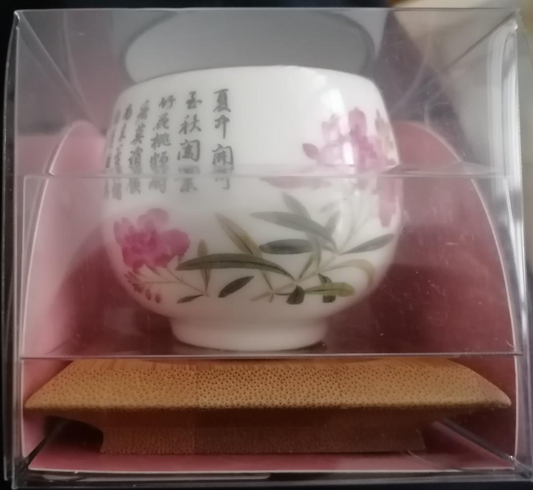 Tea Cup with Bamboo Coaster - Oleander Flower Design (Category: Coffee & Tea Tableware) located in Quezon City. Submitted by sapphiredreams_ (Listing ID 1137158519, Image 1). Description: ▪️Brand new and unused. ▪️From Taiwan National Palace Museum souvenir shop. ▪️Dimensions of tea cup: 5.5 × 5.2 × 5.2 cm ▪️Dimensions of bamboo coaster: 7.5 × 7.5 × 1 cm.