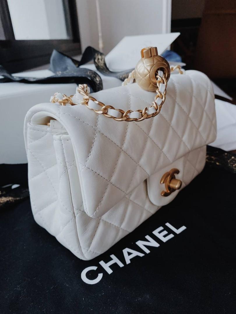 Chanel Pearl Crush 22c mini rectangular flap bag white lambskin with gold-tone  metal, Luxury, Bags & Wallets on Carousell