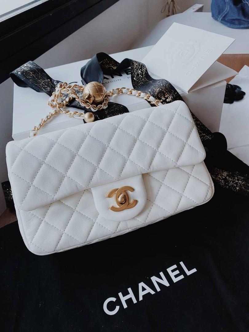 Chanel Pearl Crush 22c mini rectangular flap bag white lambskin with gold-tone  metal, Luxury, Bags & Wallets on Carousell