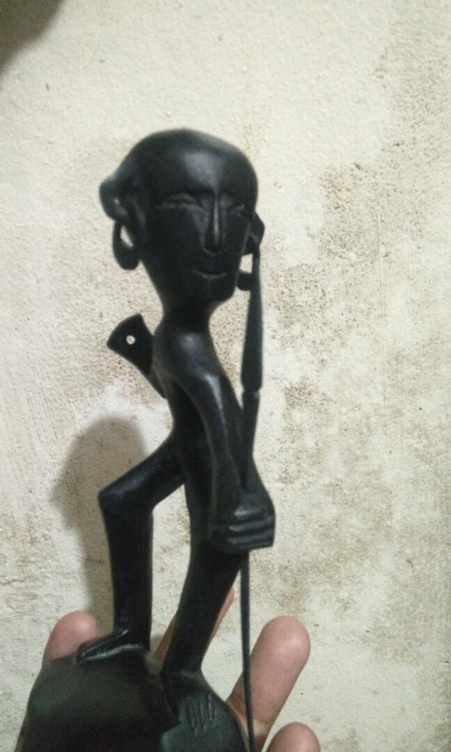 Ethnic wood carvings (Ifugao hunter, Palawan's coffin boat, Ifugao