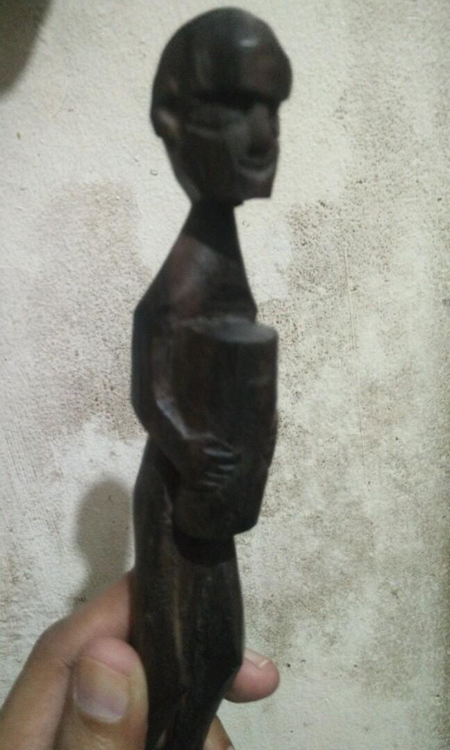 Ethnic wood carvings (Ifugao hunter, Palawan's coffin boat, Ifugao