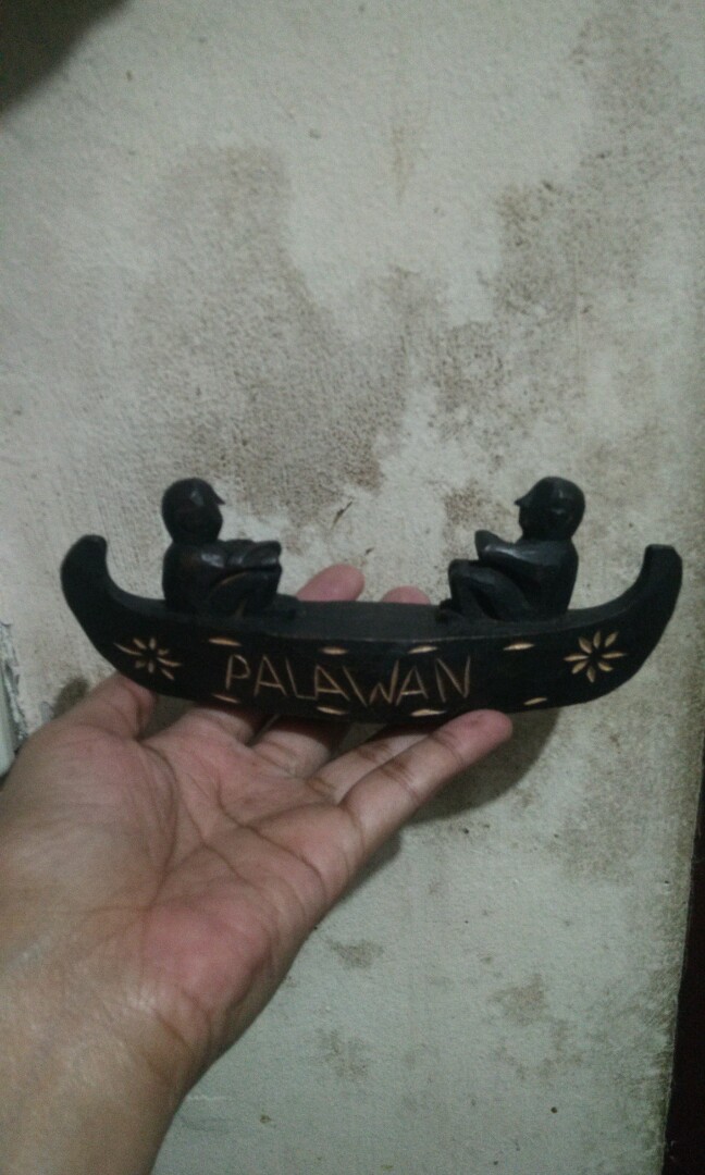 Ethnic wood carvings (Ifugao hunter, Palawan's coffin boat, Ifugao