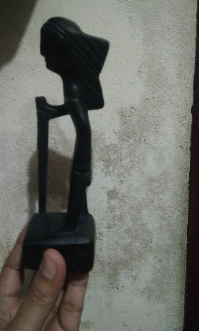 Ethnic wood carvings (Ifugao hunter, Palawan's coffin boat, Ifugao