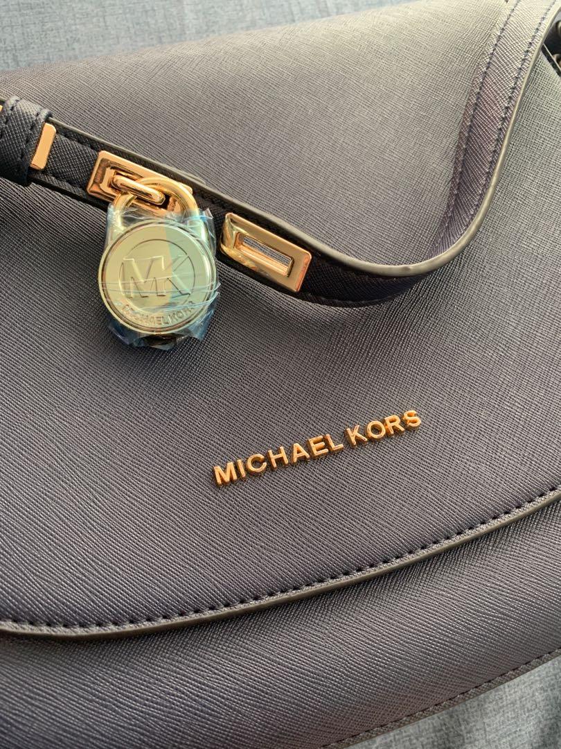 Mk locker saffiano deals sling bag