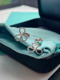 Tiffany and co paper flowers earrings with diamonds in platinum