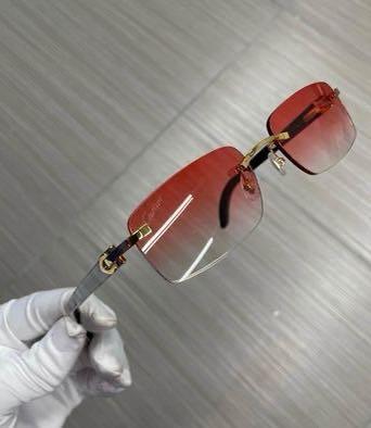 Red buffalo cartier glasses deals