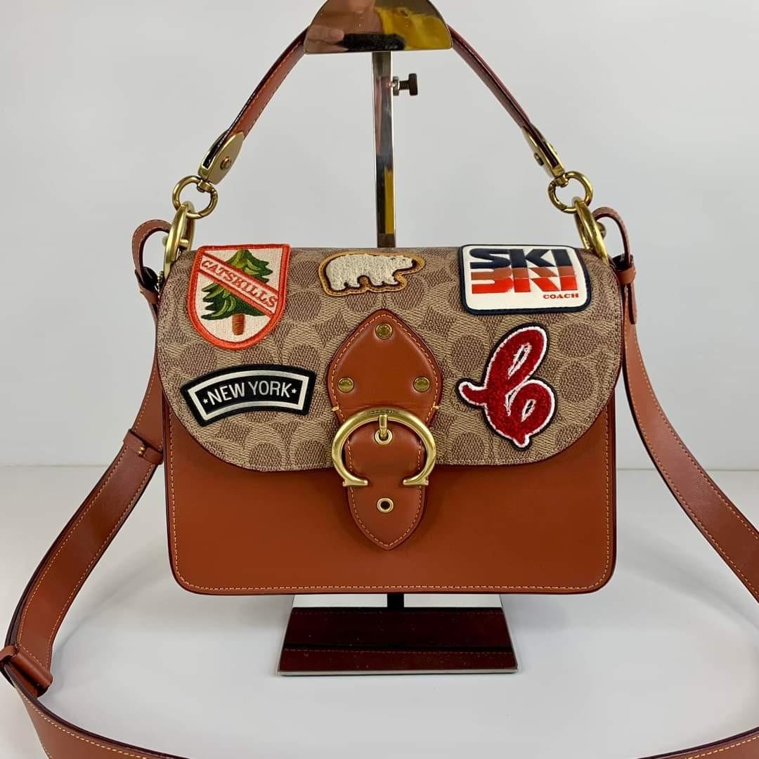 Beat shoulder bag in signature canvas with souvenir patches 2025