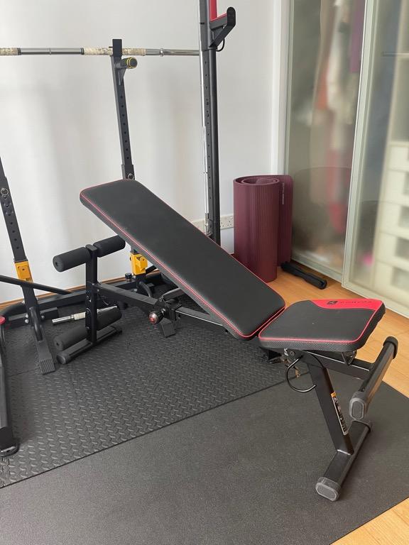 Full home gym training bench, barbells, weights, racks solid and