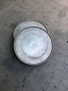 Mobile pot stand with wheels.