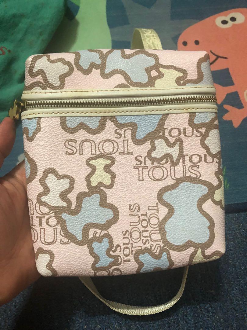 Tous sling bag shop