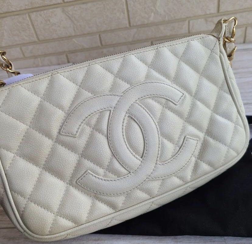 Authentic Chanel Timeless CC Pochette Quilted White Caviar Leather, Luxury,  Bags & Wallets on Carousell