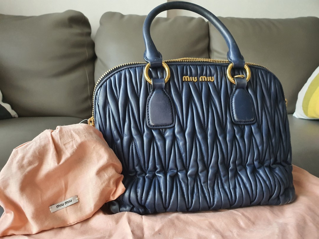 Blue miu miu bag hot sale