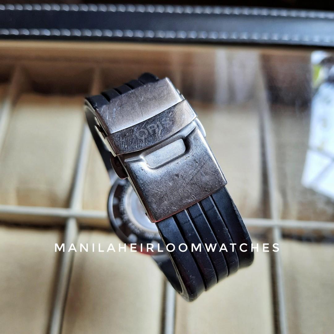 Oris TT1 Mens Swiss Automatic Watch (Category: Men's Watches) located in Manila. Submitted by watchesvideogamestoys (Listing ID 1137859525, Image 3). Description: Oris TT1 Mens Swiss Automatic Watch Details: Ref No. 7523-44 Automatic movement Cal. 635 Day and date windows positioned at 6 o’clock Dial in perfect condition; hour markers and hand set as well Inner bezel has some imperfections Stainless steel case has minimal signs of use Signed crow