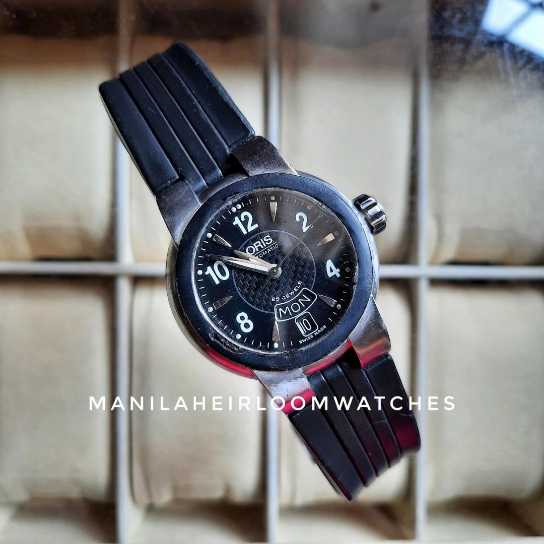 Oris TT1 Mens Swiss Automatic Watch (Category: Men's Watches) located in Manila. Submitted by watchesvideogamestoys (Listing ID 1137859525, Image 1). Description: Oris TT1 Mens Swiss Automatic Watch Details: Ref No. 7523-44 Automatic movement Cal. 635 Day and date windows positioned at 6 o’clock Dial in perfect condition; hour markers and hand set as well Inner bezel has some imperfections Stainless steel case has minimal signs of use Signed crow