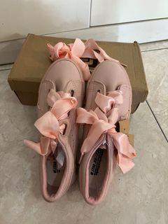Pink ribbon sneakers