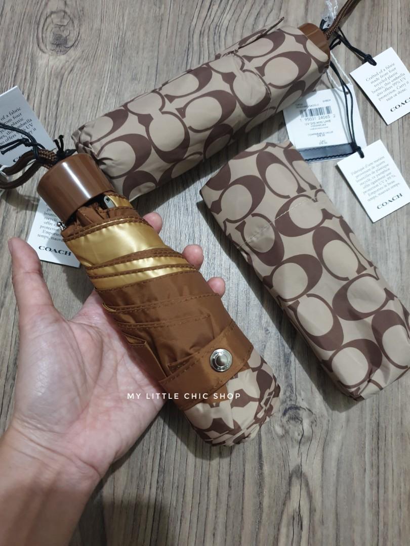 Coach signature mini umbrella, Hobbies & Toys, Travel, Umbrellas on