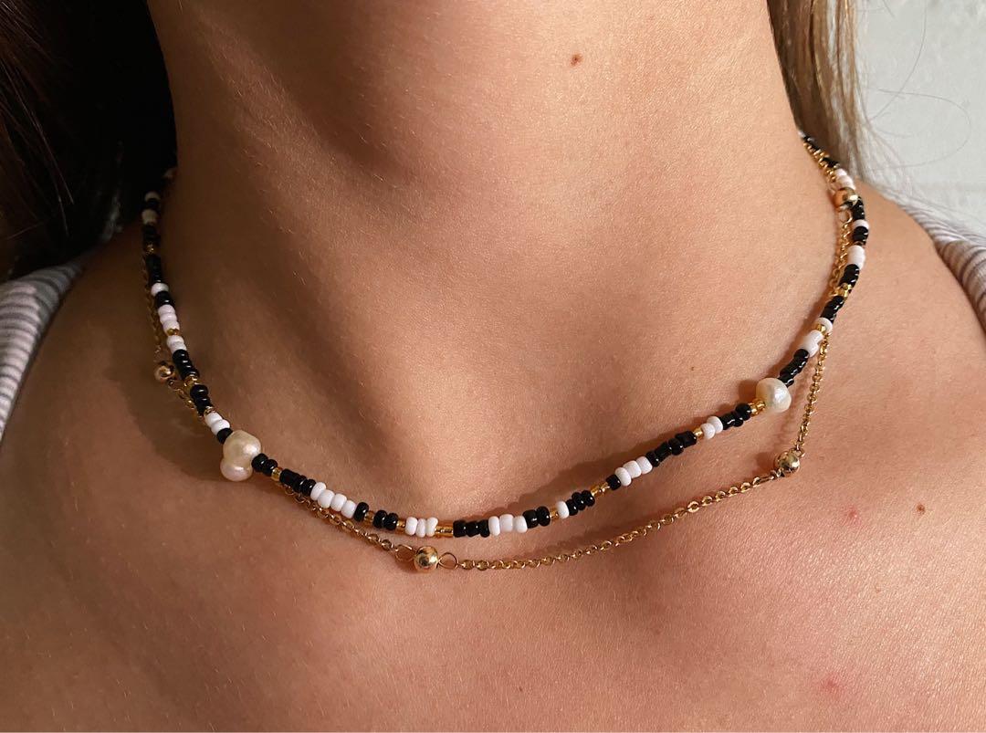 gold and white glass beaded necklace 