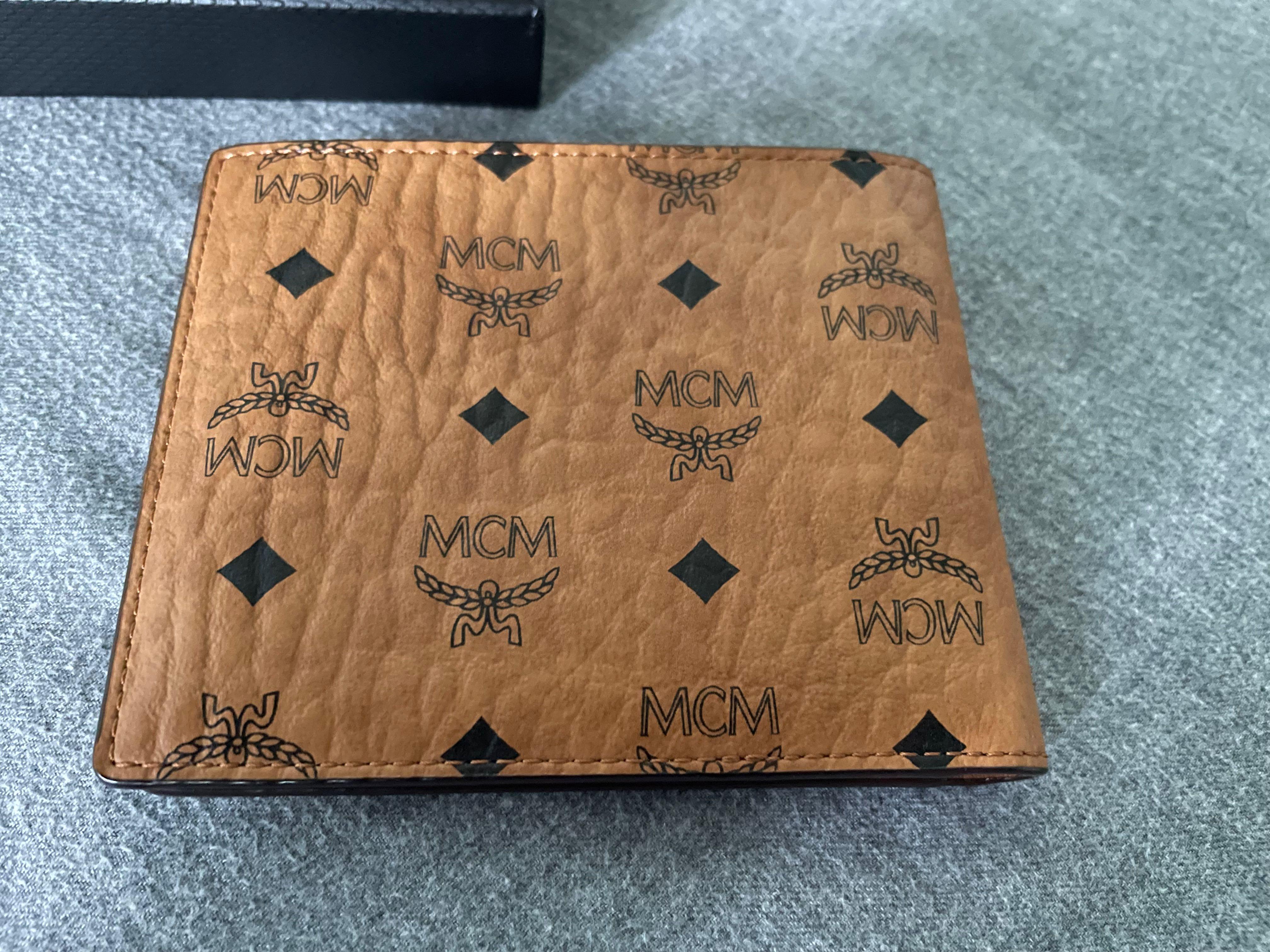 MCM Claus Bifold Wallet, Men's Fashion, Watches & Accessories, Wallets &  Card Holders on Carousell