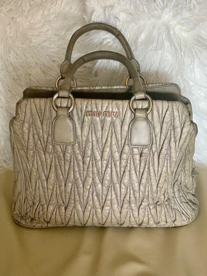 Miu Miu Handbag (Category: Luxury Bags & Wallets) located in Batangas. Submitted by olxph_744406747 (Listing ID 1138030163, Image 1). Description: Preloved Miu Miu Handbag, quilted, heavily used but still okay, no strap included but you can put extra strap, inner of the bag is still great! .