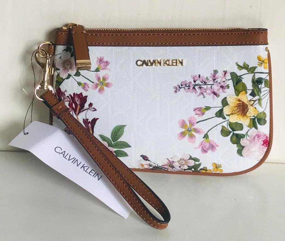 NEW! CALVIN KLEIN CK WHITE FLORAL CLUTCH WALLET BAG WRISTLET $58 SALE,  Women's Fashion, Bags & Wallets, Wallets & Card holders on Carousell