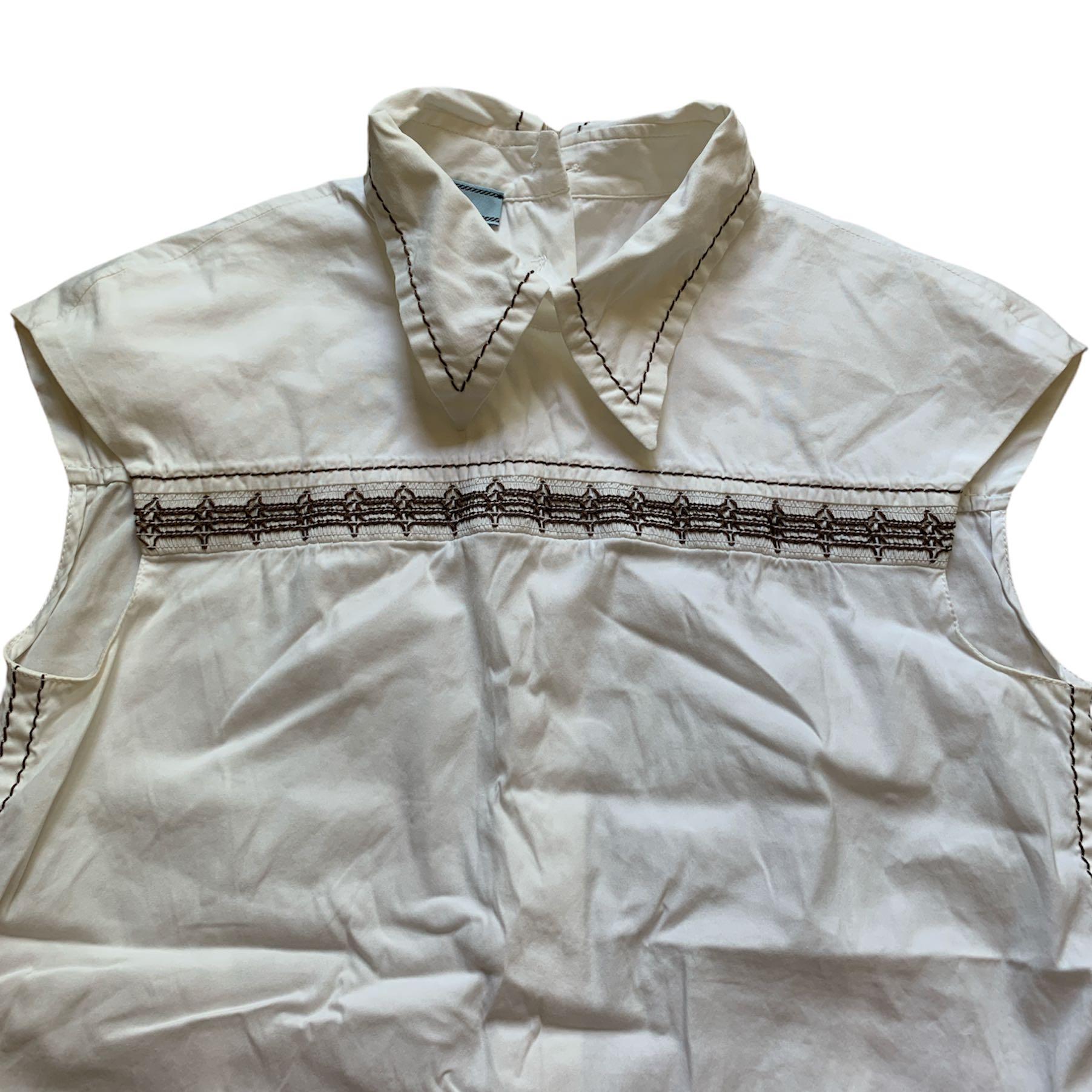 Prada Tops (Category: Sleeveless) located in Singapore. Submitted by xiadaowo (Listing ID 1138216708, Image 1). Description: Prada sleeveless top $150 authentic, good condition Measurements (+/- 1 inch): Ptp: 15 Length: 22.8 Prada sleeveless top with tie detail $150 authentic, good condition Measurements (+/- 1 inch): Ptp: 16.5 Length: 23.8 Registered mail: $5.