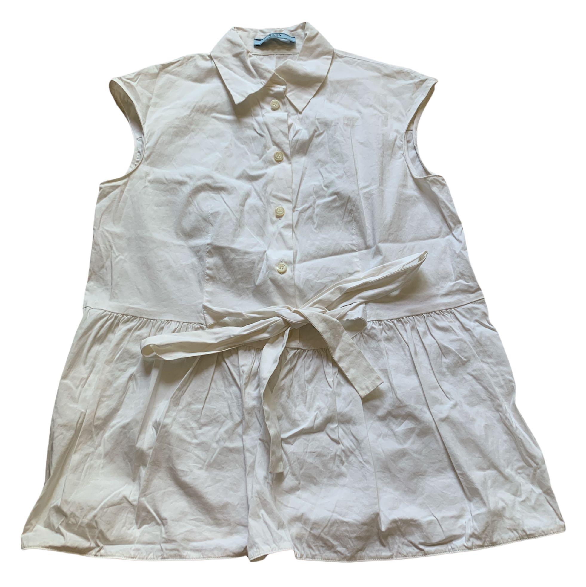 Prada Tops (Category: Sleeveless) located in Singapore. Submitted by xiadaowo (Listing ID 1138216708, Image 6). Description: Prada sleeveless top $150 authentic, good condition Measurements (+/- 1 inch): Ptp: 15 Length: 22.8 Prada sleeveless top with tie detail $150 authentic, good condition Measurements (+/- 1 inch): Ptp: 16.5 Length: 23.8 Registered mail: $5.