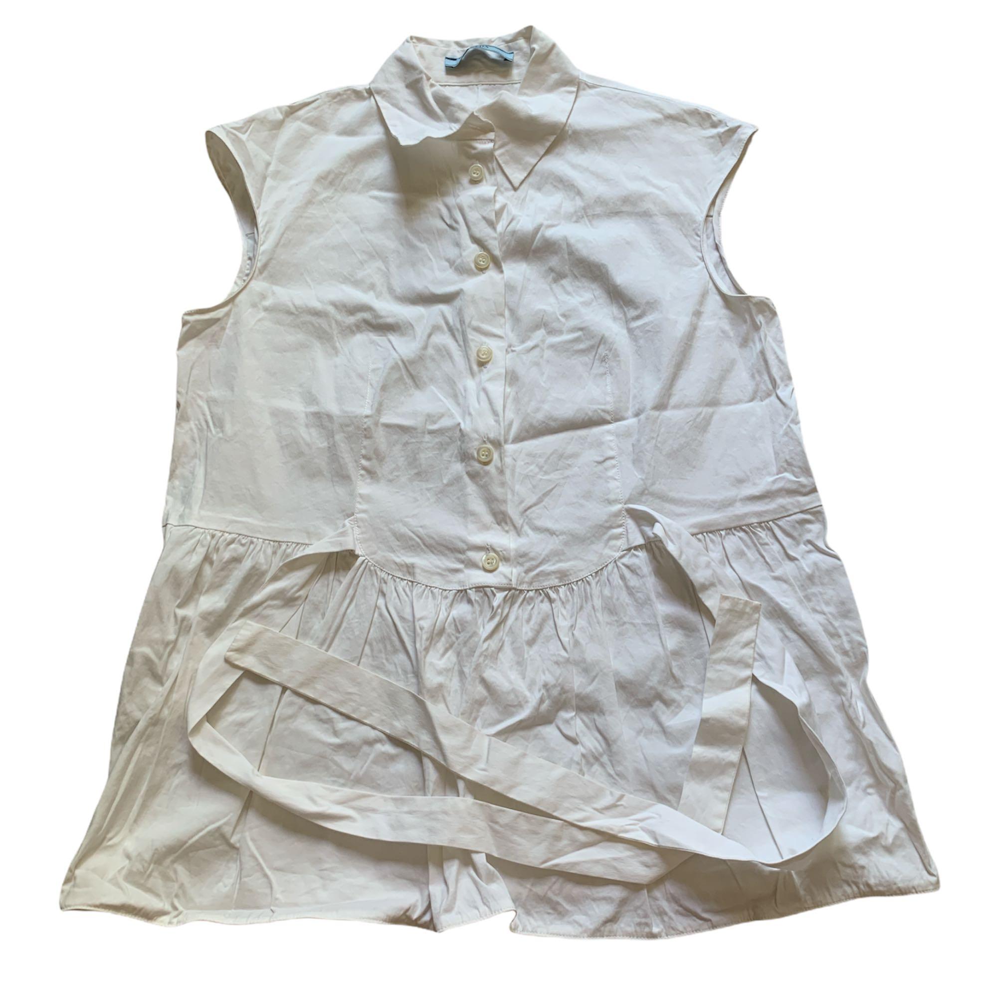 Prada Tops (Category: Sleeveless) located in Singapore. Submitted by xiadaowo (Listing ID 1138216708, Image 5). Description: Prada sleeveless top $150 authentic, good condition Measurements (+/- 1 inch): Ptp: 15 Length: 22.8 Prada sleeveless top with tie detail $150 authentic, good condition Measurements (+/- 1 inch): Ptp: 16.5 Length: 23.8 Registered mail: $5.