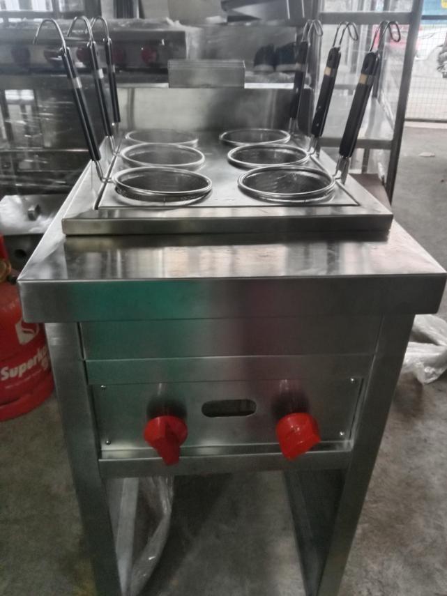 Customise noodle broiler (Category: Other Kitchenware & Tableware) located in Antipolo. Submitted by hk.trading (Listing ID 1138448229, Image 2). Description: Specs: T304 1.0mm stainless top plate, 0.9mm stainless steel bottom framing and body / 2 pcs crocodile burner , 2 gas valve and manifold / Hairline Finish Dimension: 450x750x850.