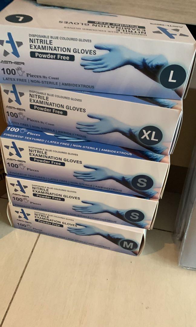Nitrile examination gloves , medical gloves . Bulk ready stocks