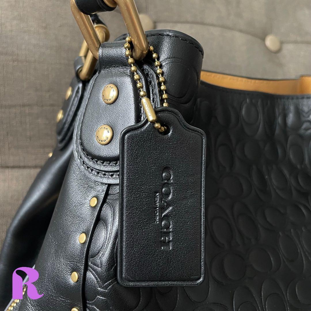 Edie shoulder bag 31 in signature leather with rivets on sale