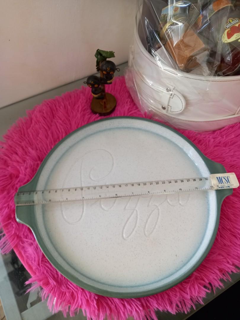 STONEWARE PIZZA SERVING PLATE (Category: Bakeware) located in Cavite. Submitted by qapirazzo_voutik23 (Listing ID 1138505165, Image 3). Description: STONEWARE PIZZA SERVING PLATE / DISH - MOIRA OF CHESTERFIELD - OVEN TO TABLE 12 INCHES IN DIAMETER 14 INCHES WITH HANDLE.