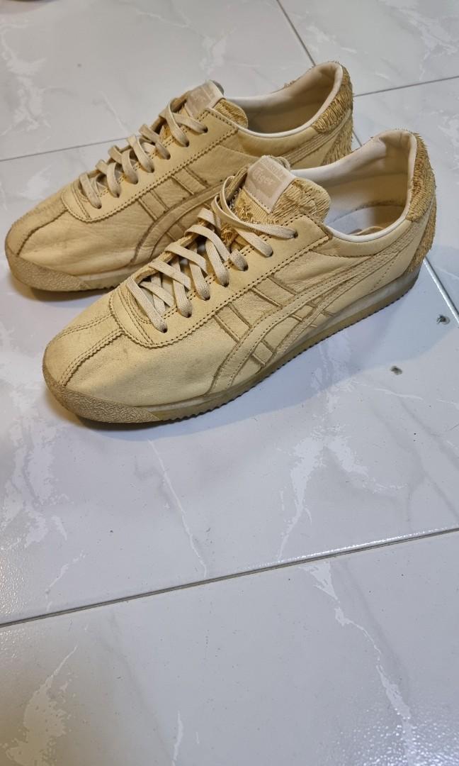 Stylish Onitsuka Tiger Sneaker. Bought in California. (Category: Sneakers) located in Singapore. Submitted by thisistheone (Listing ID 1138545659, Image 3). Description: Selling a whole lot of Authentic Sneakers( See my Listing) which my shoe cardboard can't take it anymore. Hence need to sell! my Size is US 9.5 to 10. May or may not have box. I am a responsible and hygienic seller, will sanitise and dust/clean off as much as I can as I have not 