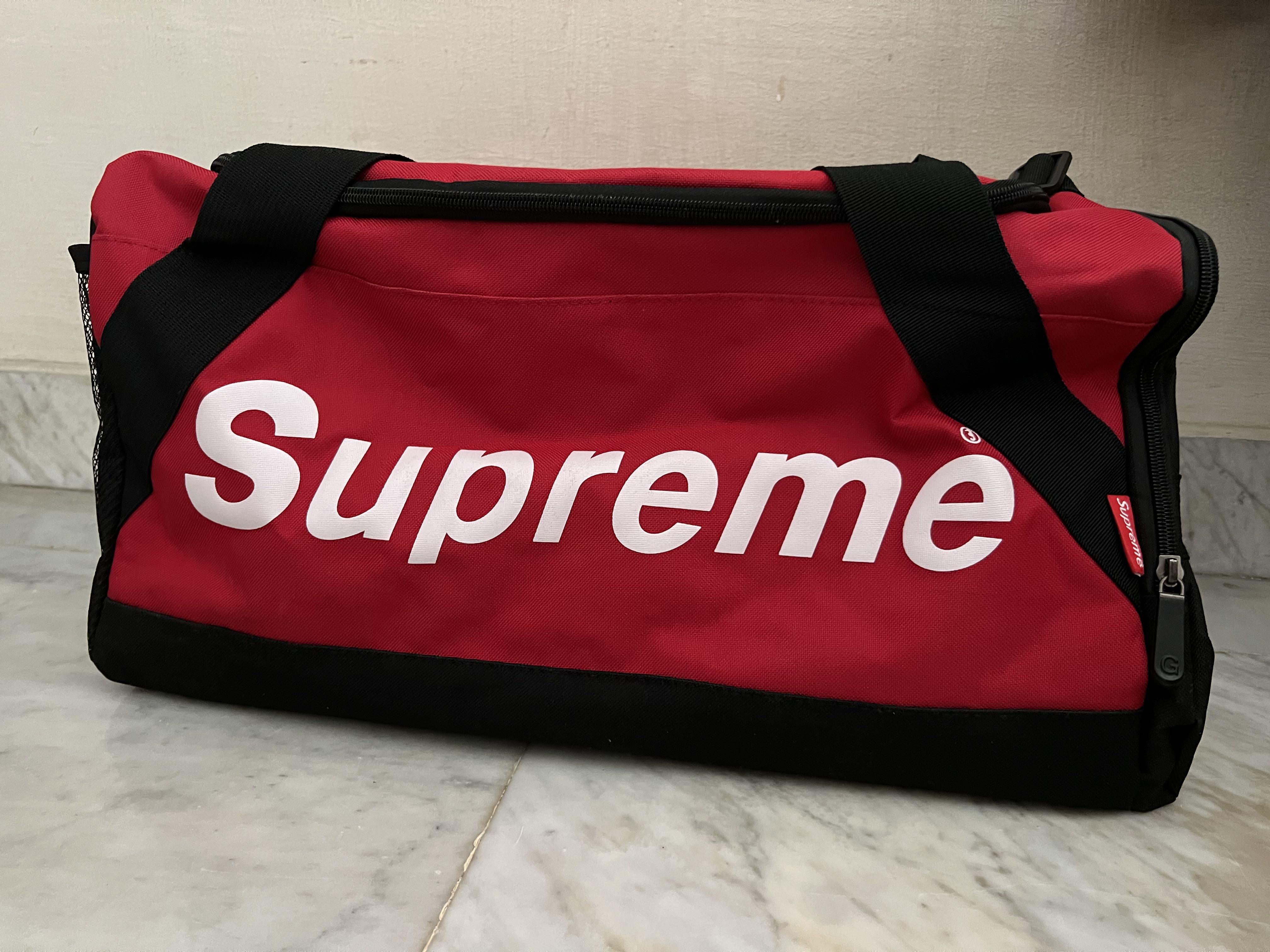 Supreme red 2025 duffle bag
