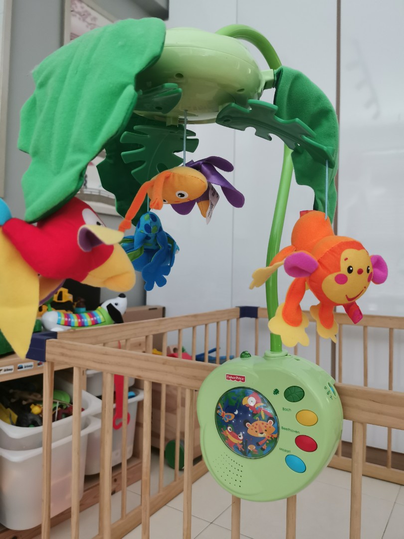 FisherPrice Rainforest PeekABoo Leaves Musical Mobile, Babies & Kids