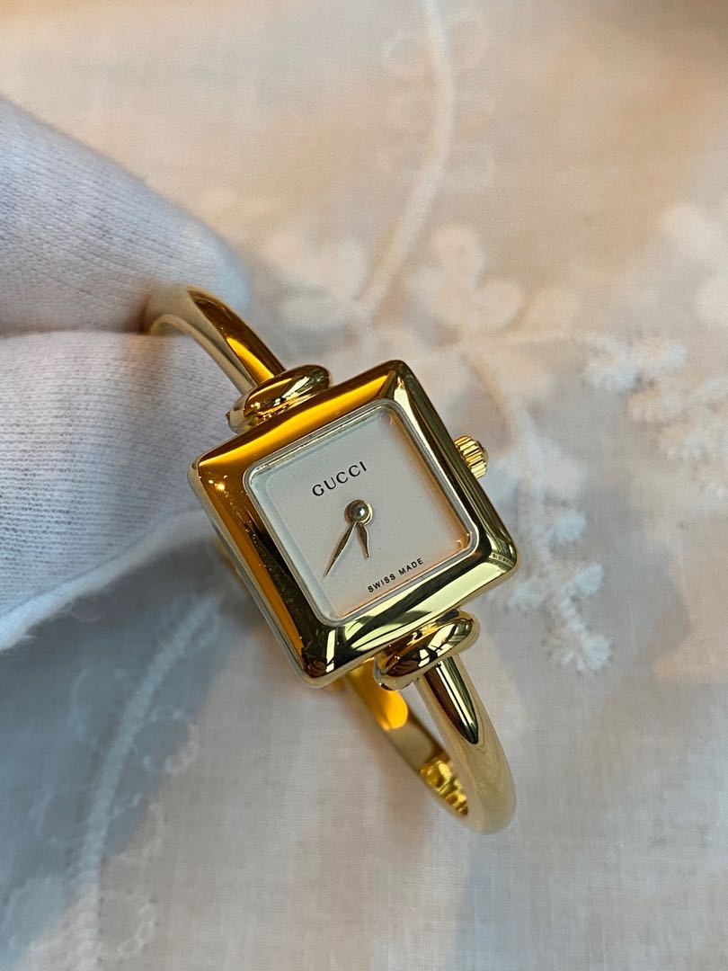 Vintage gucci gold bangle sales watch