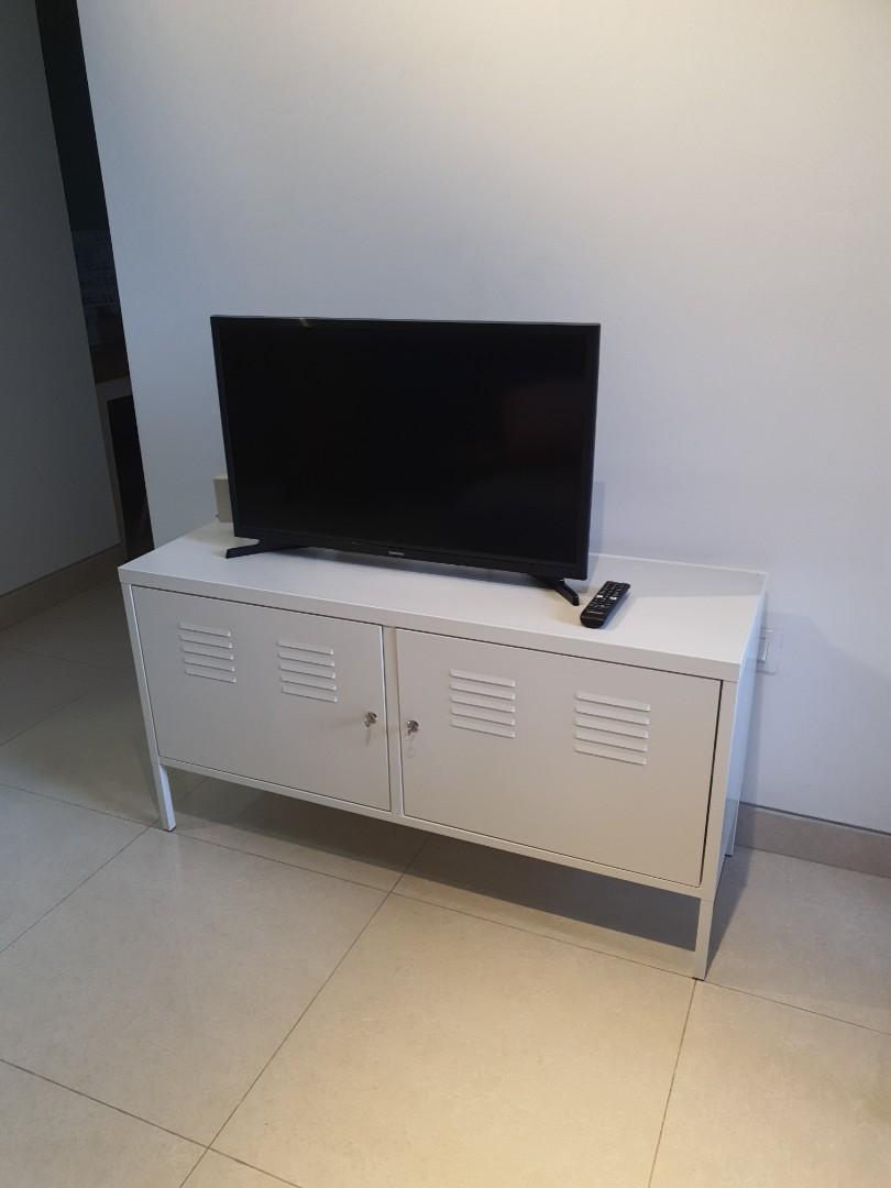 TV shelf (Category: Shelves, Cabinets & Racks) located in Singapore. Submitted by ibn (Listing ID 1134929607, Image 2). Description: L 118 x W 40 x H 63 As new, metallic white, self collection..