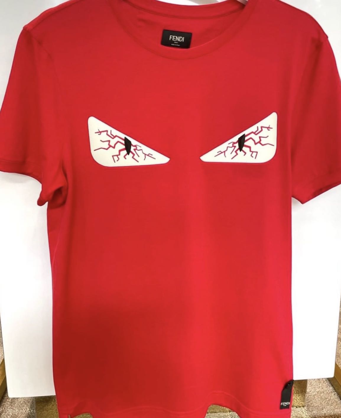Fendi t shirt red eyes on sale