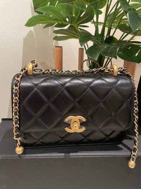 Chanel Pearl Crush Calfskin and gold tone metal black small flap bag,  Women's Fashion, Bags & Wallets, Shoulder Bags on Carousell