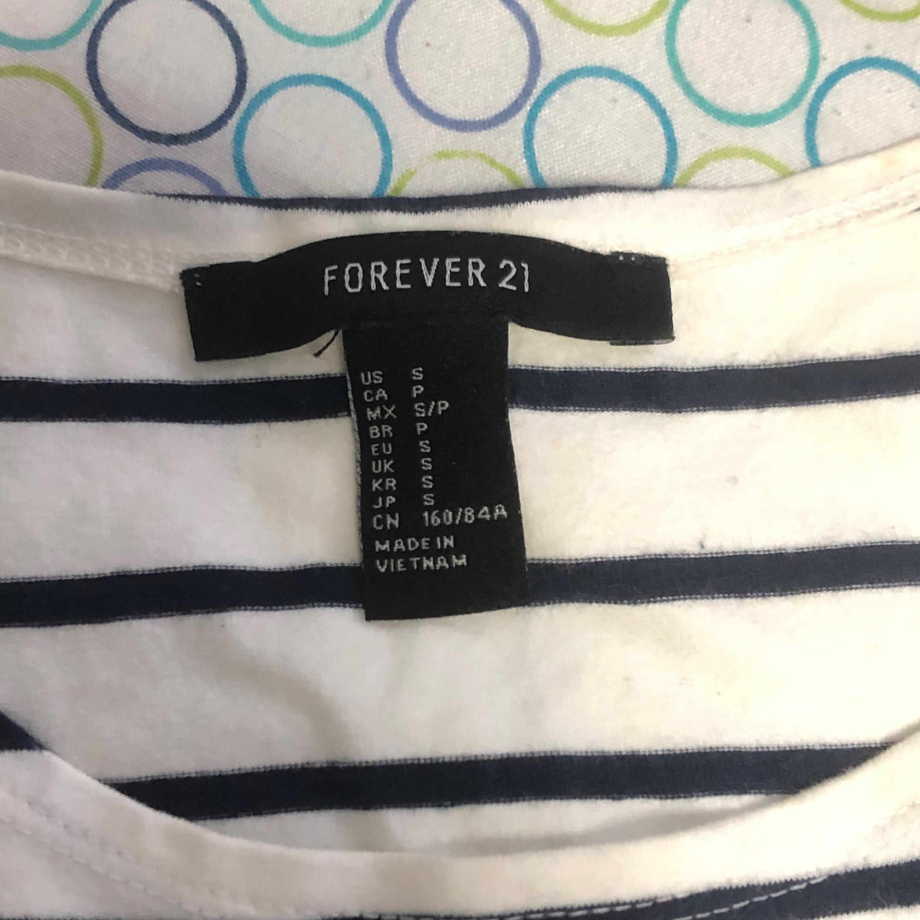 Forever 21 striped sleeveless cropped top (Category: Sleeveless) located in Mandaluyong City. Submitted by tkbuys (Listing ID 1138595583, Image 2). Description: With slight stains due to storage.