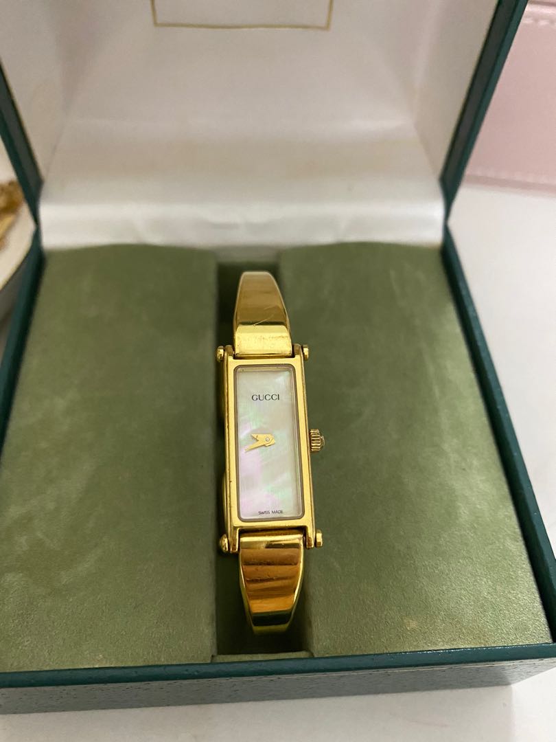 Small gold online gucci watch