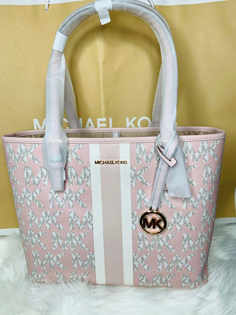 Michael Kors tote bag (Category: Bags & Wallets) located in Regina. Submitted by burnne (Listing ID 1138747933, Image 1). Description: Authentic with tag.