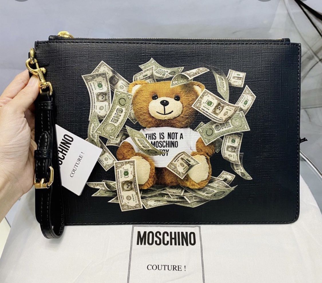 Moschino cash bear clutch, Luxury, Bags u0026 Wallets on Carousell