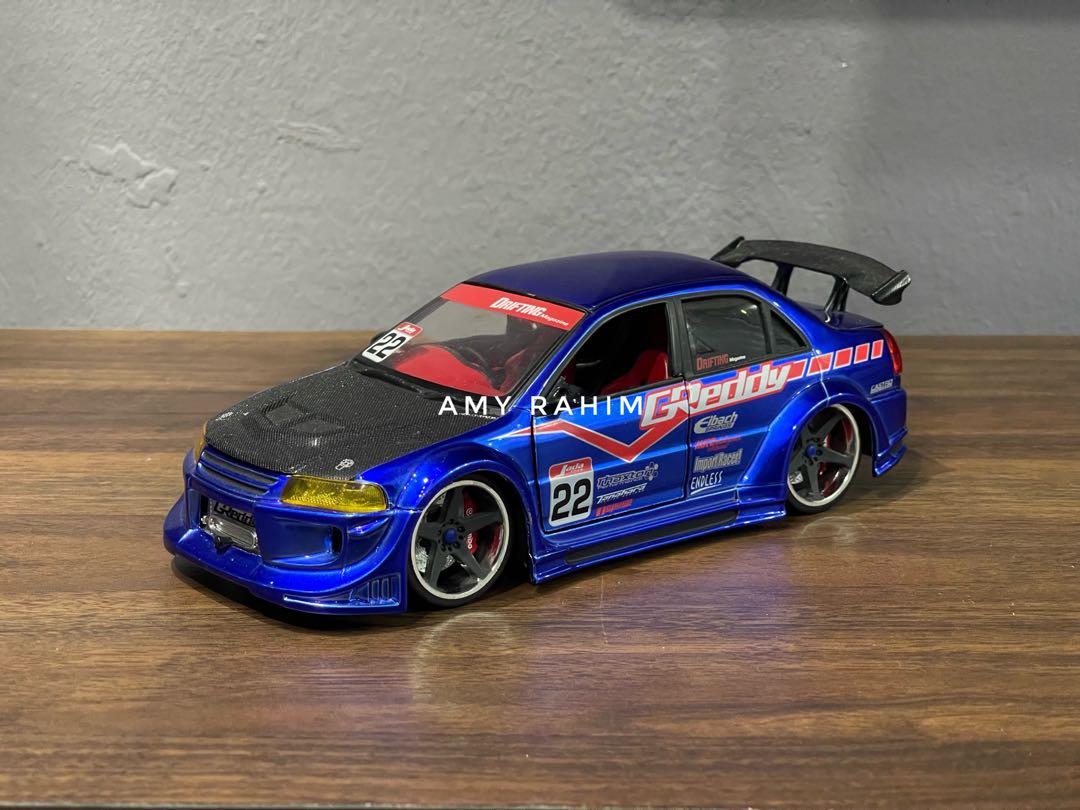Jada Toys Import Racer Drifting Mitsubishi Lancer Evolution VI