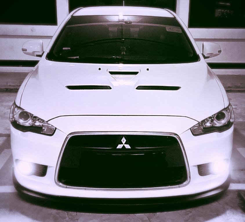 Mitsubishi Lancer EX 2.0 GT (M) (Category: Used Cars) located in Singapore. Submitted by dansuave (Listing ID 1138926713, Image 1). Description: Probably one of the youngest Lancer GT manual around. Registered Nov 2010. 2nd owner. RFS : Family needs. Reluctant sale (not urgent). Legal mods – Evo X Cams/Throttle body/Bonnet/cold air intake/Fujitsubo exhaust/Pivot ETC/Prodrive rims/Recaro E9 seat/Ksport coilovers (still have warranty)/Ralliart 2-po